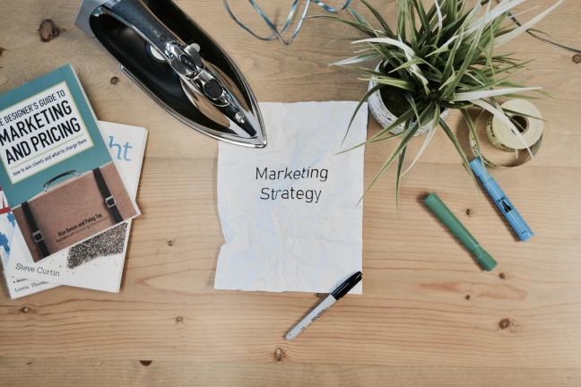 'Marketing strategy' text on ragged cloth